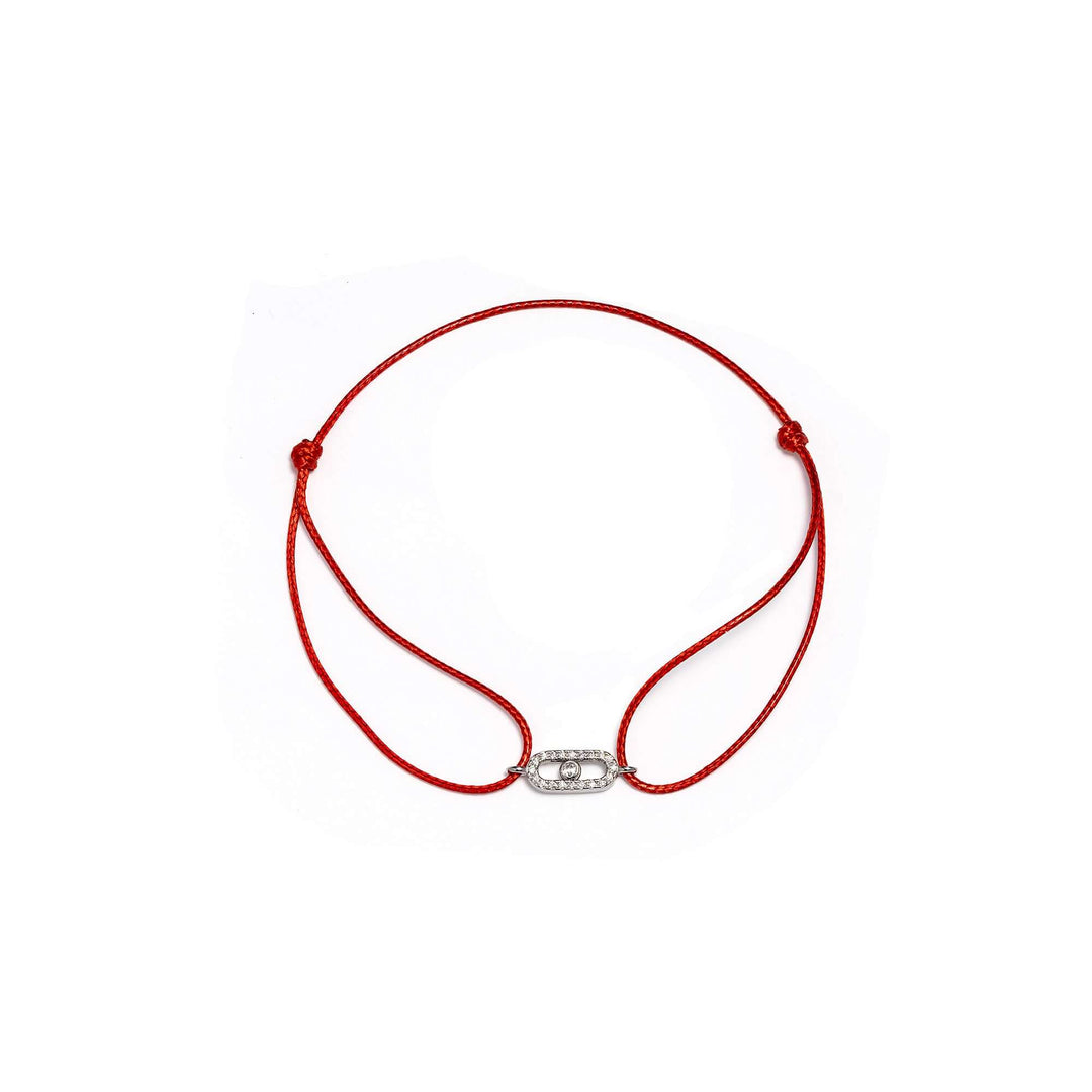 Червен конец със сребърен елемент с циркони.