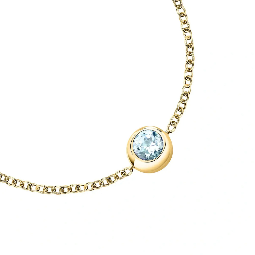 Дамска сребърна гривна с жълто покритие и син топаз