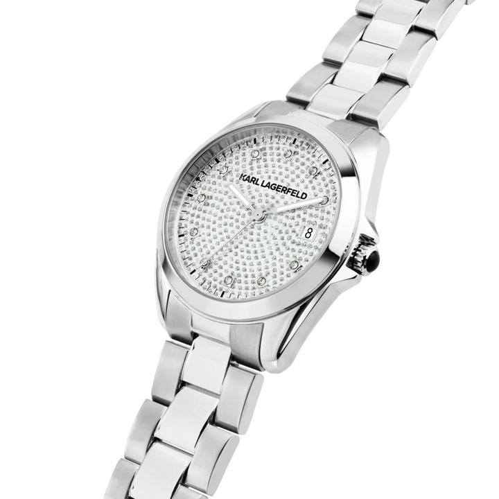 Близък план на дамски часовник Karl Lagerfeld Round Essentials със сребрист циферблат с кристали и прозорец за дата – R0553101509