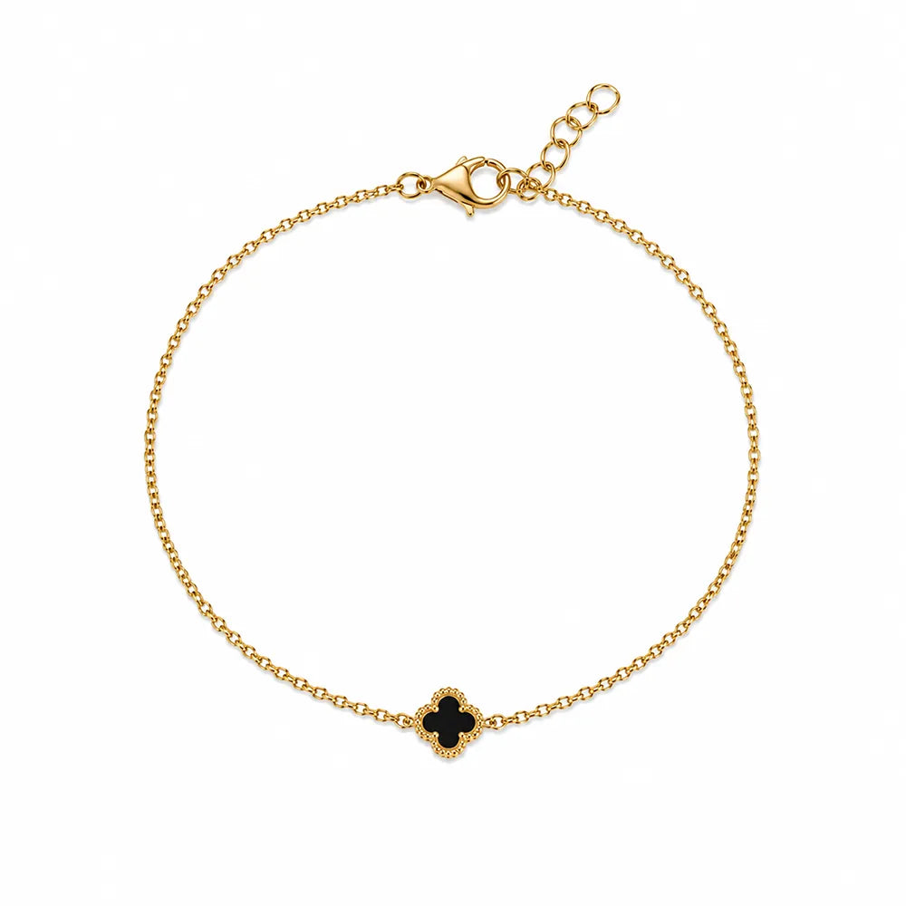 Дамска гривна с една детелина от жълто злато 14K Senso Gold с черен оникс на бял фон
