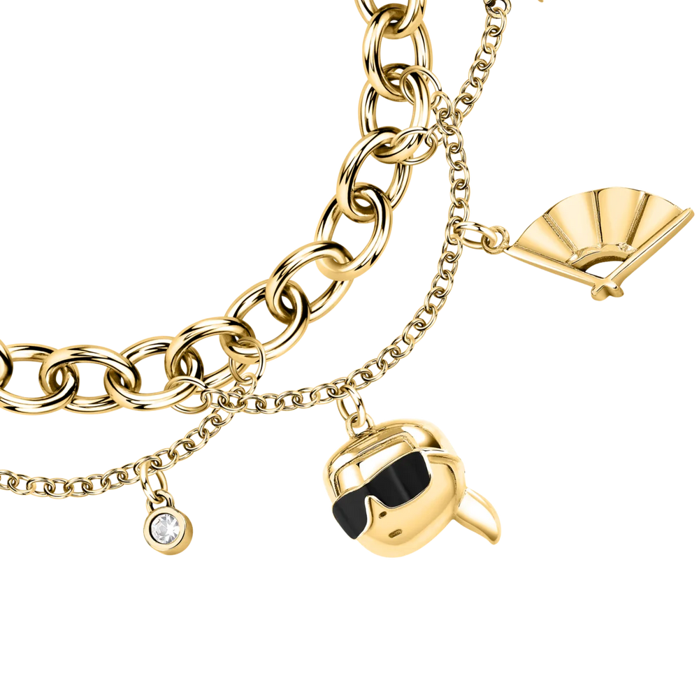 Елегантна златиста гривна Karl Lagerfeld с висулки глава с очила, ръкавица, ветрило и кристал – модел KLAYD11, детайлен близък план