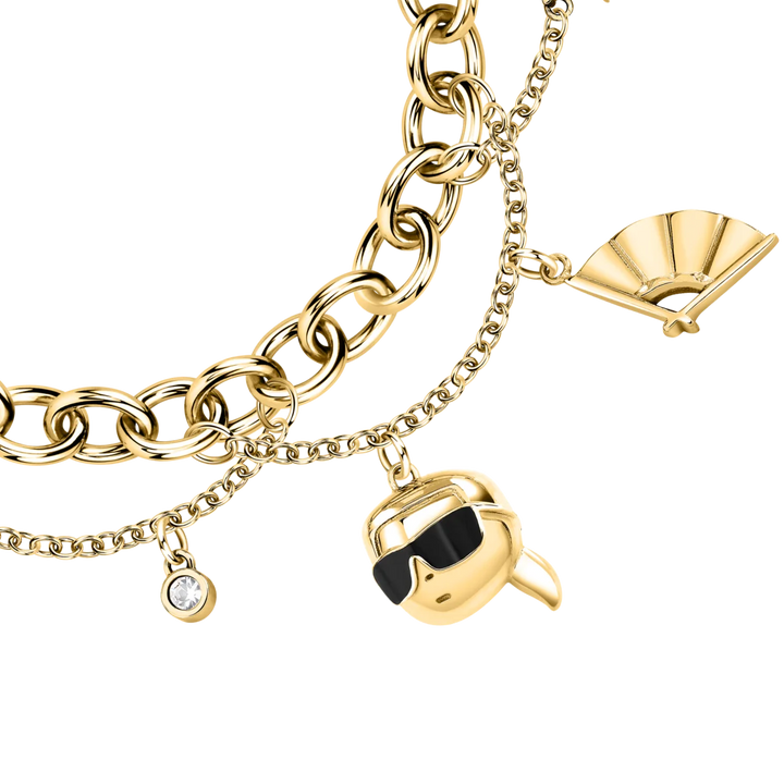 Елегантна златиста гривна Karl Lagerfeld с висулки глава с очила, ръкавица, ветрило и кристал – модел KLAYD11, детайлен близък план