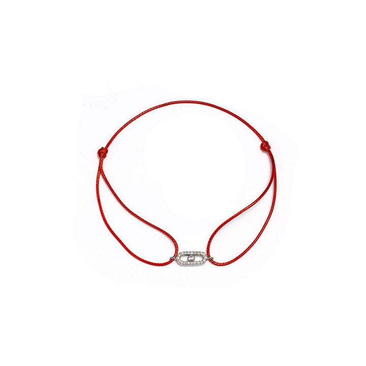 Червен конец със сребърен елемент с циркони.