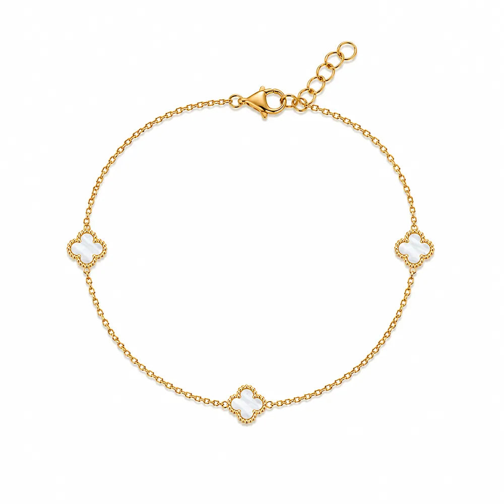 Дамска гривна с три детелини от жълто злато 14K Senso Gold с бял седеф на бял фон
