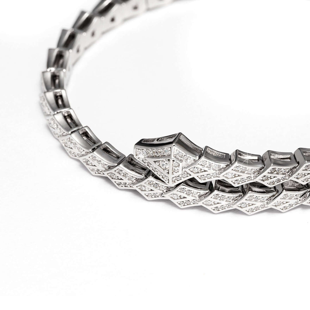 Дамска твърда гривна изработена от сребро със змийски акцент.  Senso Silver