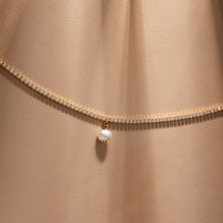 Дамска тенис гривна от сребро със златно покритие. Morellato Perla SXU59. Инкрустирани циркони и сладководна перла.