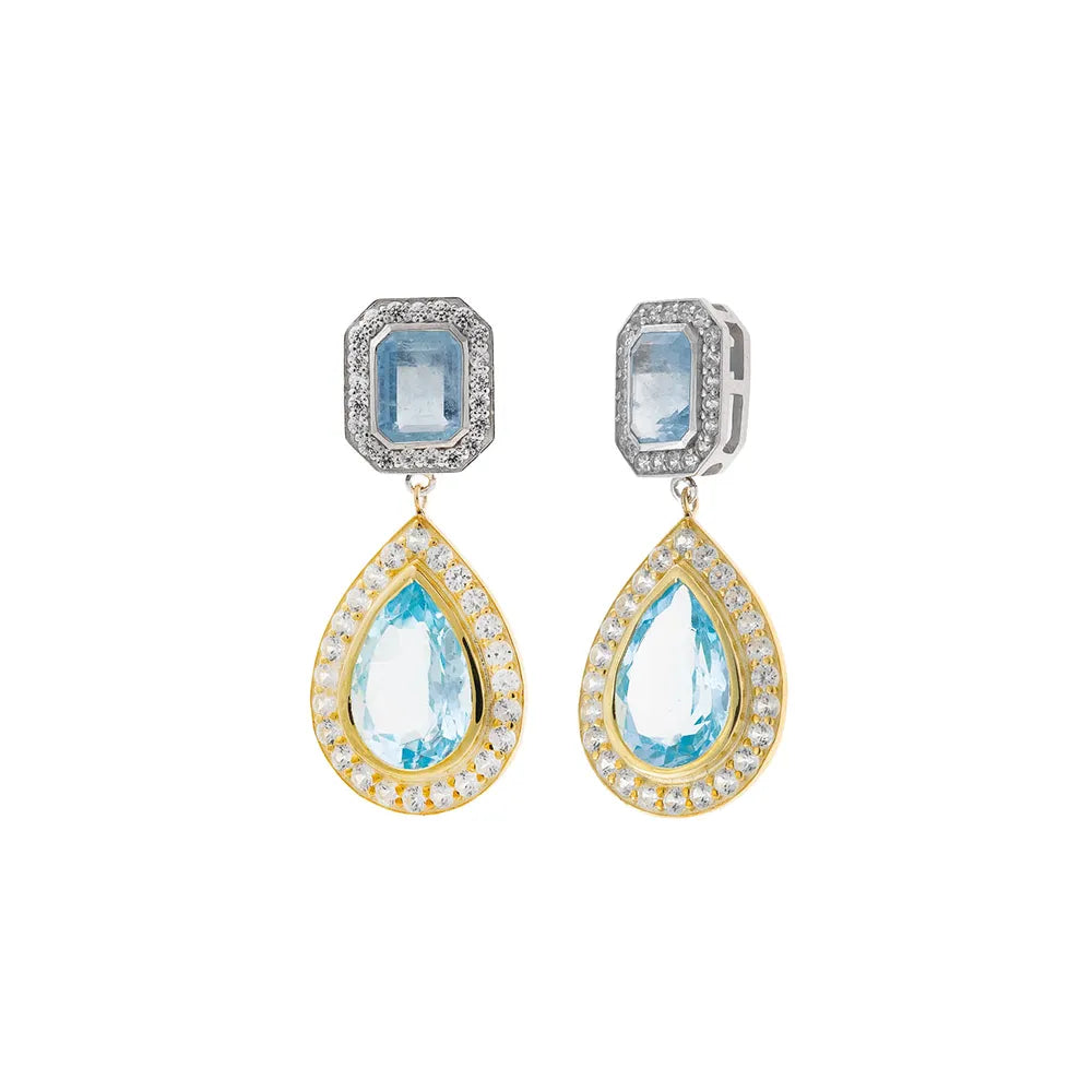 Детайлни сребърни обеци Salvatore Plata с аквамарин и циркони на бял фон.