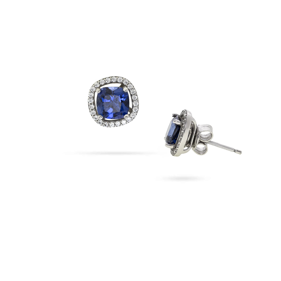 Дамски сребърни обеци на винт с тъмно сини циркони.