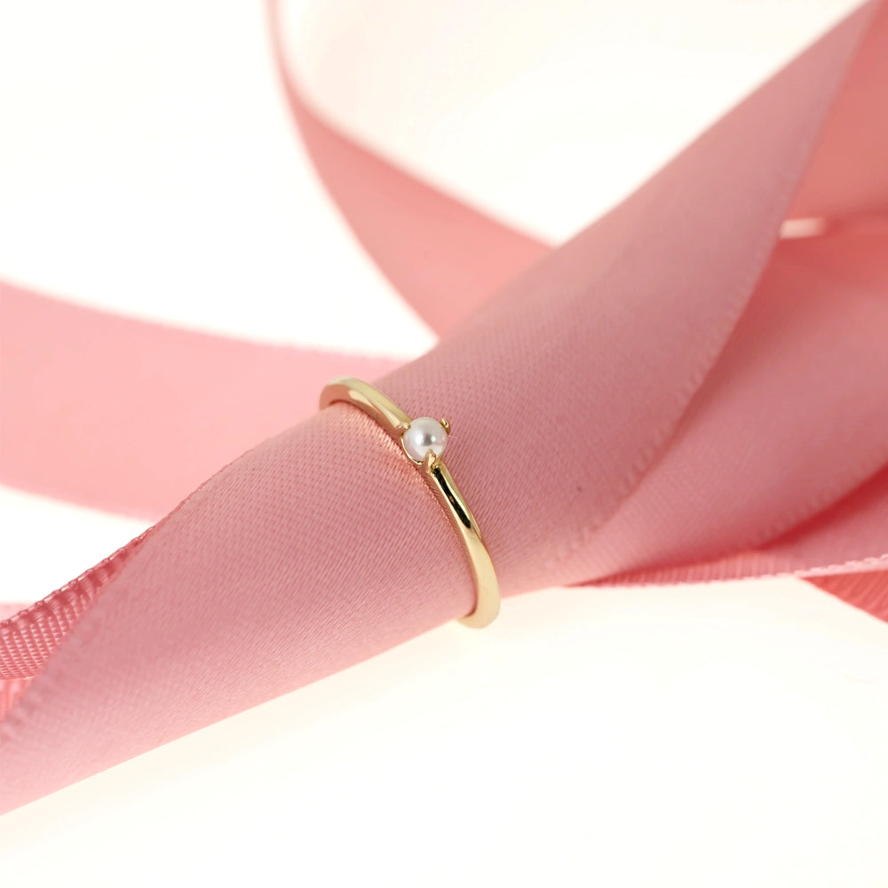 Златен пръстен със сладководна перла.