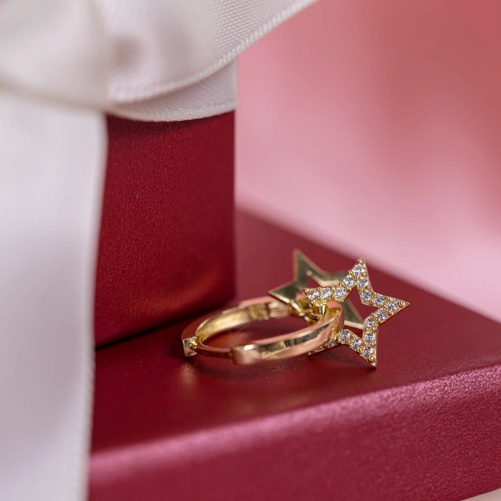 Дамска златна обеца от 14к злато със звезди с циркони