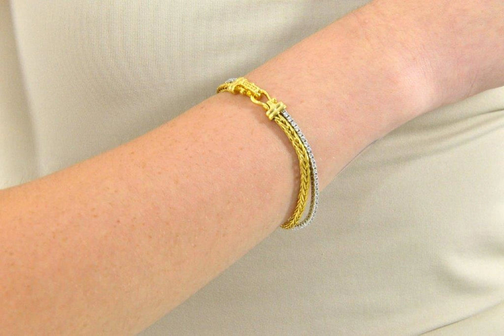 Two-tone silver herringbone bracelet with CZ Salvatore Plata — worn on a model