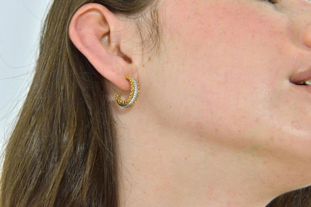 Two-tone silver hoops with a chain motif Salvatore Plata — worn on a model