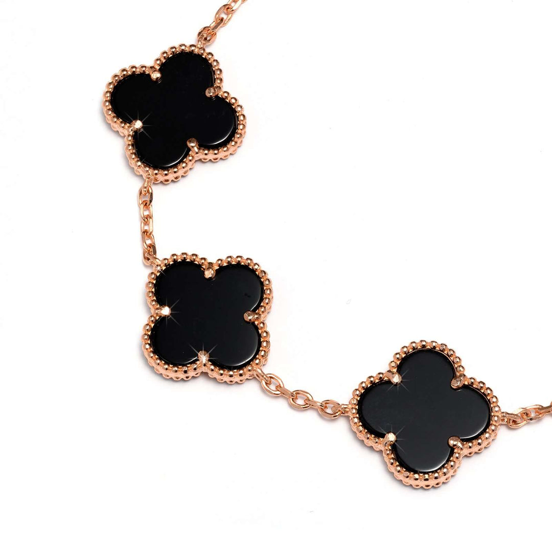 Сребърна гривна с розово златно покритие и детелини от черен оникс