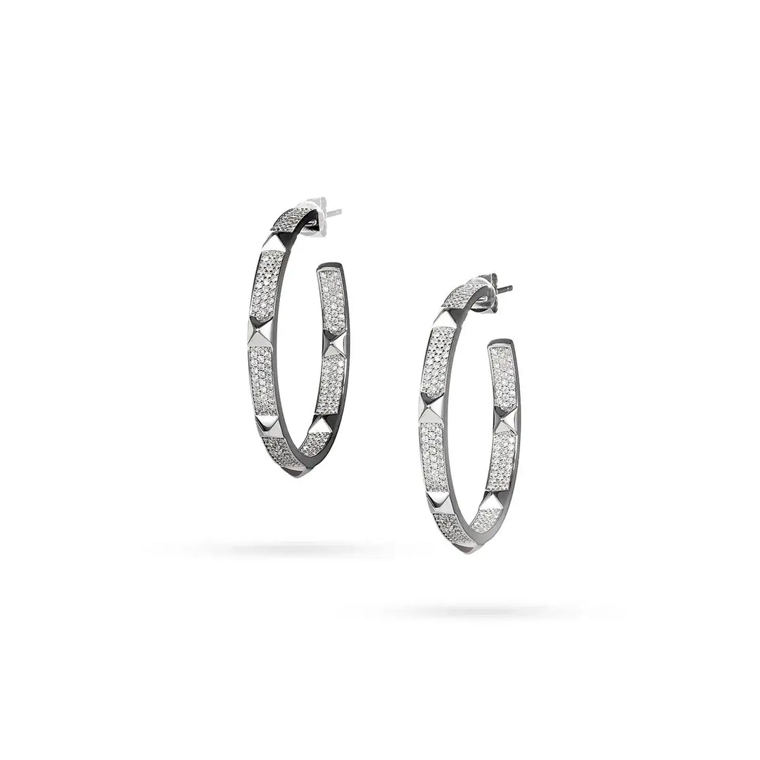 Обеци от сребро с визуална форма на халки и инкрустация от циркони