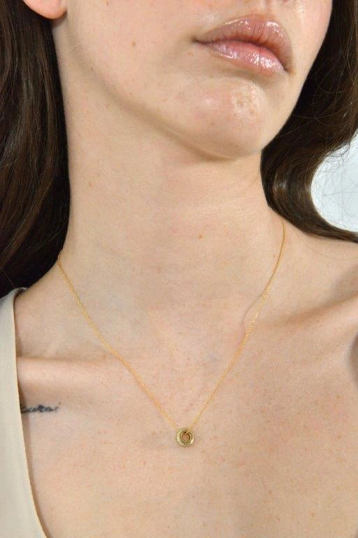 Gold-plated silver necklace with circular CZ pendant Salvatore Plata — worn on a model