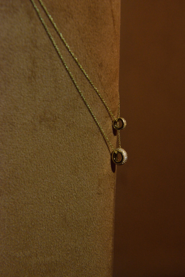 Gold-plated silver necklace with circular CZ pendant Salvatore Plata — jewellery composition