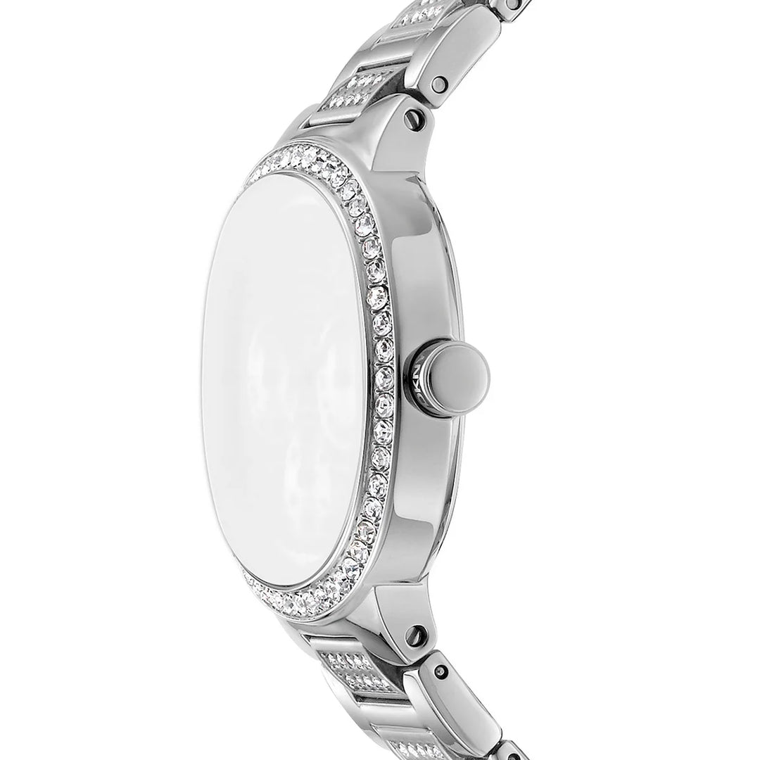 Профил на дамски часовник DKNY – сребрист корпус с кристален безел, мултифункция Miyota 6P79, модел DK1L084M0215