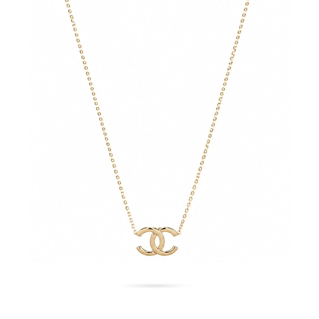 Златно колие с преплетен геометричен мотив от жълто злато 14K Senso Gold DN3258 на бял фон