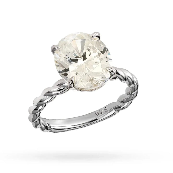 Сребърен пръстен с овален централен циркон и усукана халка