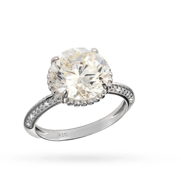 Сребърен пръстен с голям централен циркон и малки камъни