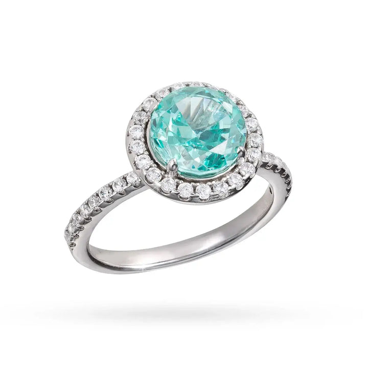 Сребърен пръстен с тюркоазен централен циркон и инкрустация от камъни