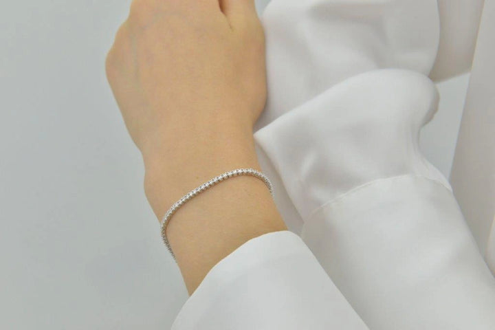 Silver tennis bracelet with white CZ Salvatore Plata — worn on a model