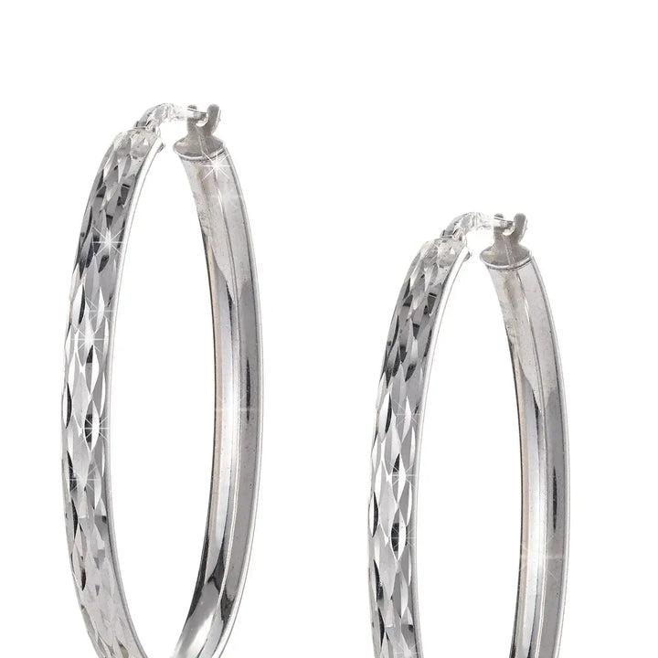 Сребърни дамски обеци халки с фасетирана повърхност