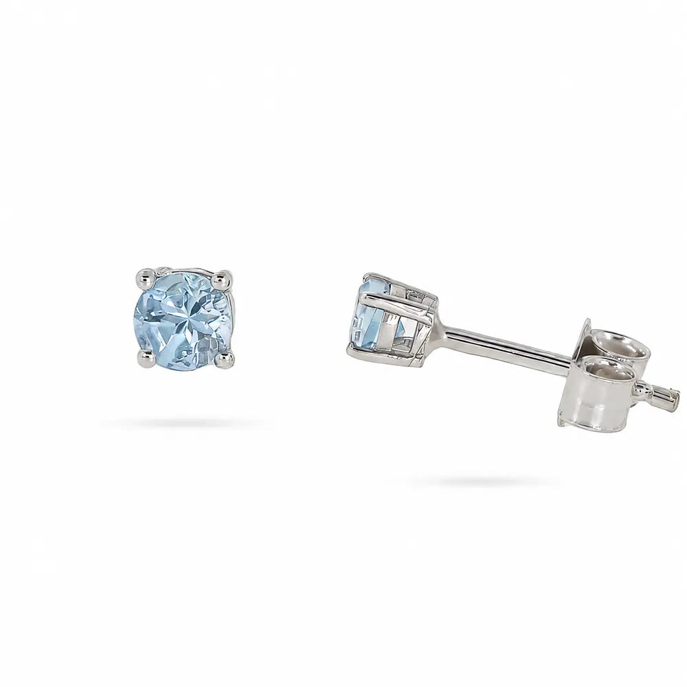 Обеци от 14K бяло злато Senso Diamonds със син топаз 0.21 ct на бял фон

