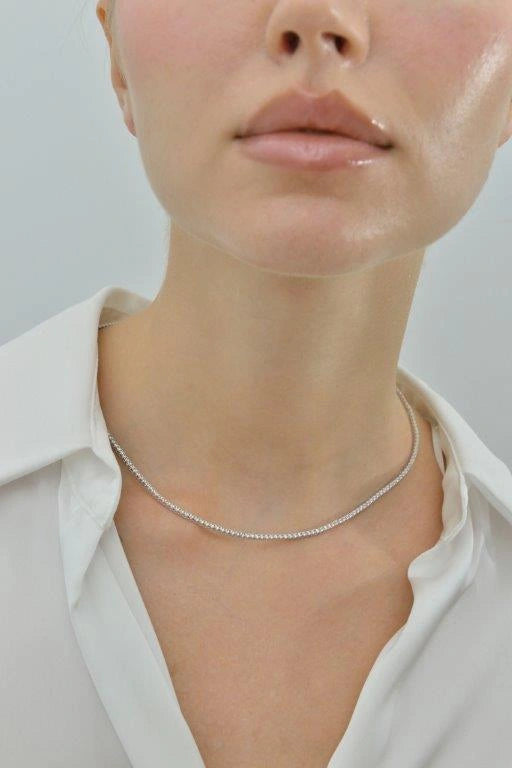 Silver rivière necklace with white CZ Salvatore Plata — worn on a model