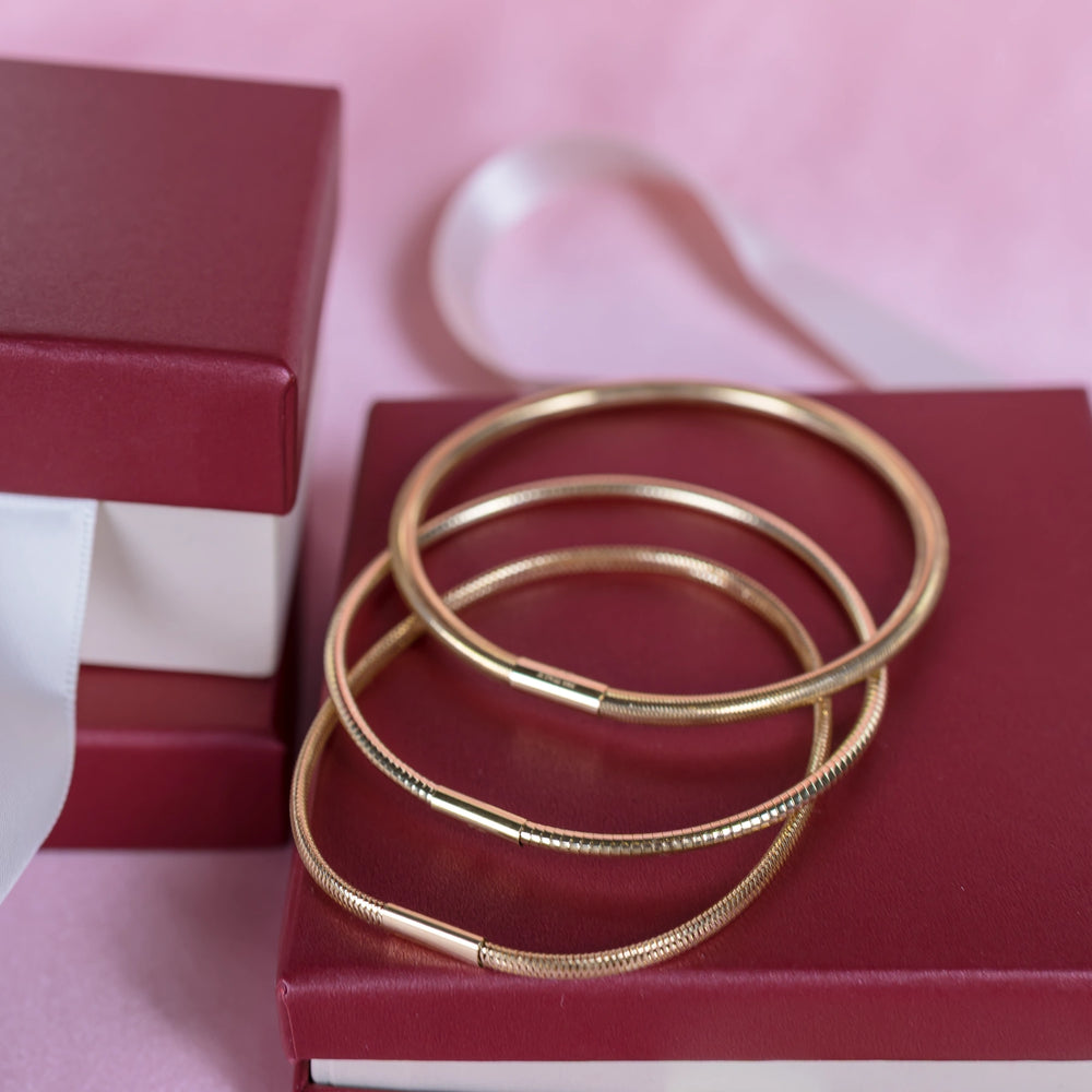 Дамски златни гривни от Senso Gold.