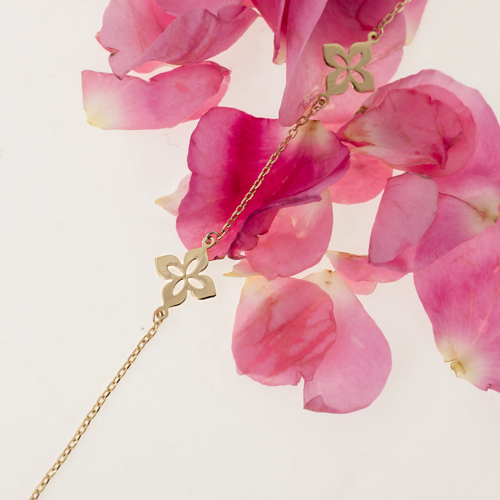 Дамска златна гривна с нежни цветя. Senso Gold