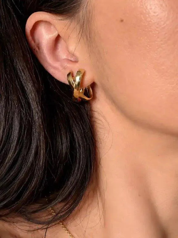 14K Reversible Gold Earrings with an X Design by Senso Gold, DE2493, worn on a model