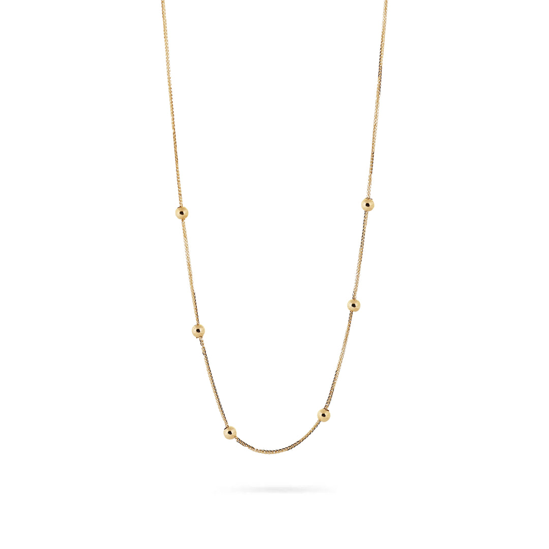 Фино златно колие с малки топчета 14К Senso Gold, на бял фон